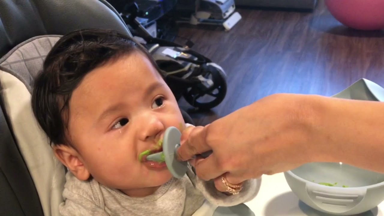 Baby eating Peas for the FIRST time!