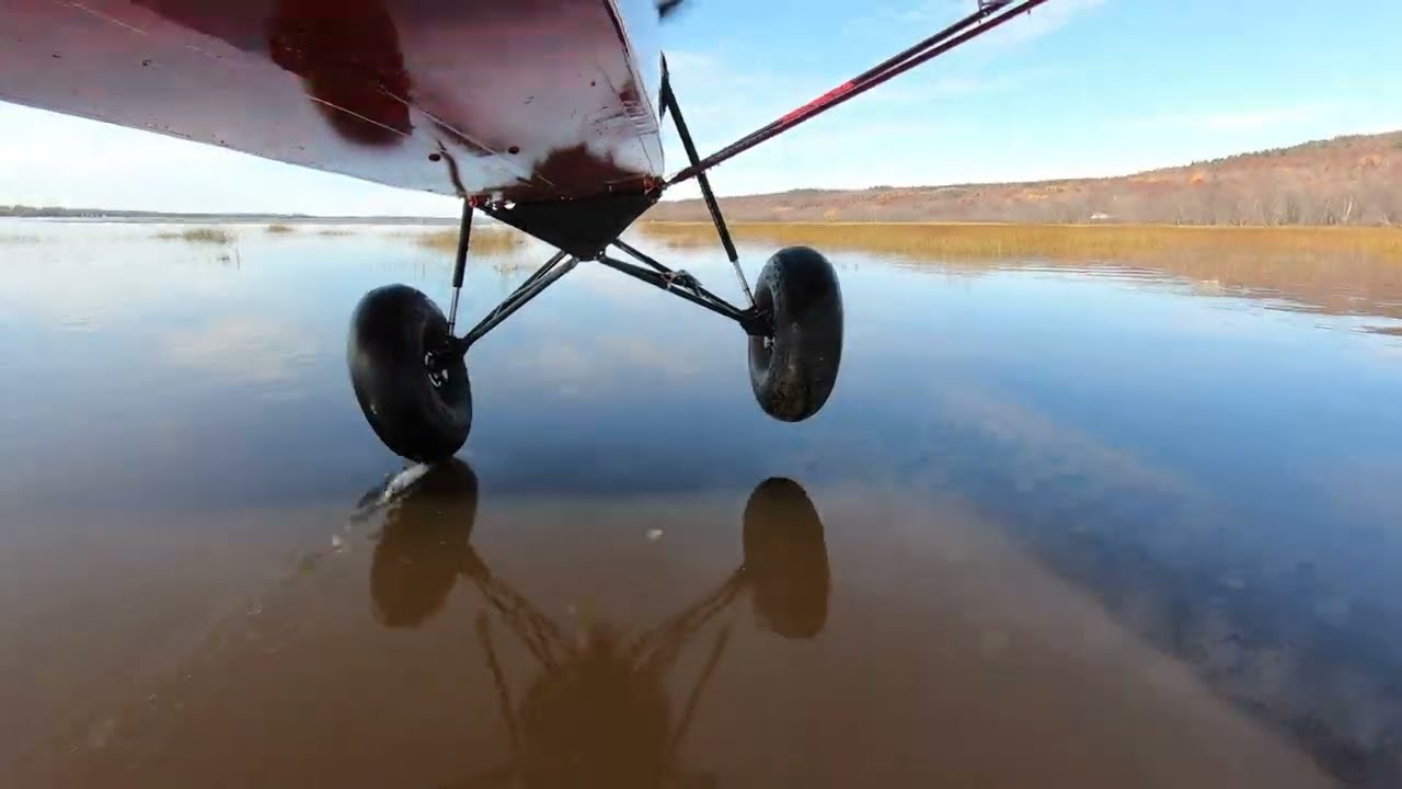 Super Cub STOL   water assisted  on Alaskan Bushwheels.