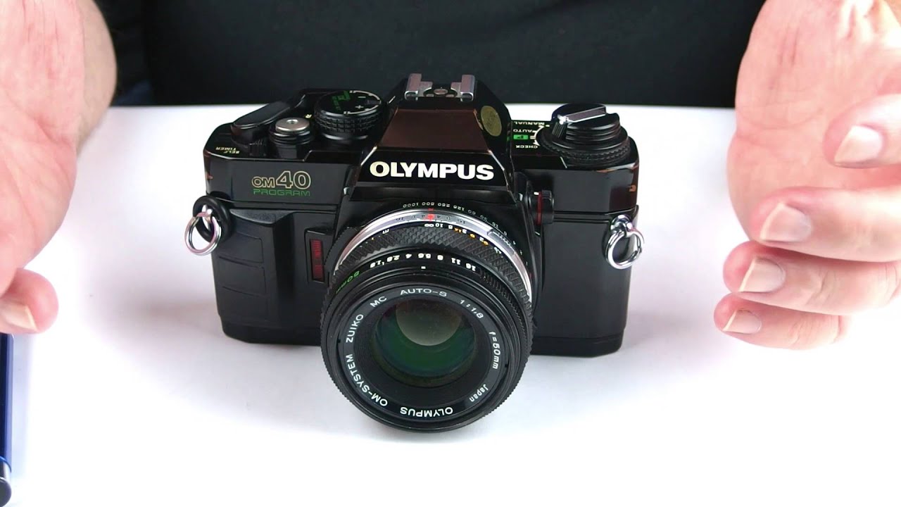 Обзор объектива Oly35mm - OM-40