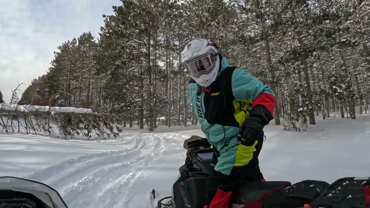 Snowmobiling in Gaylord michigan-crossing otsego lake