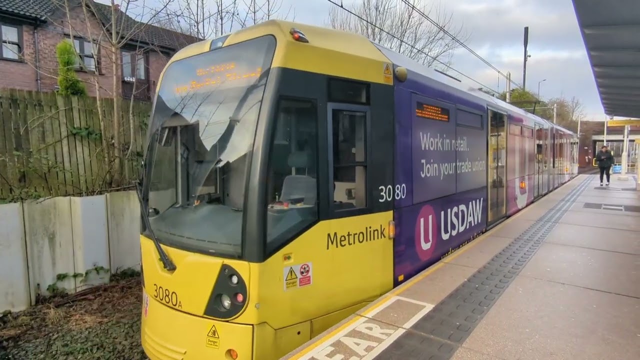 Manchester Metrolink M5000 3080 USDaw livery arriving and departing St Werburgh's road