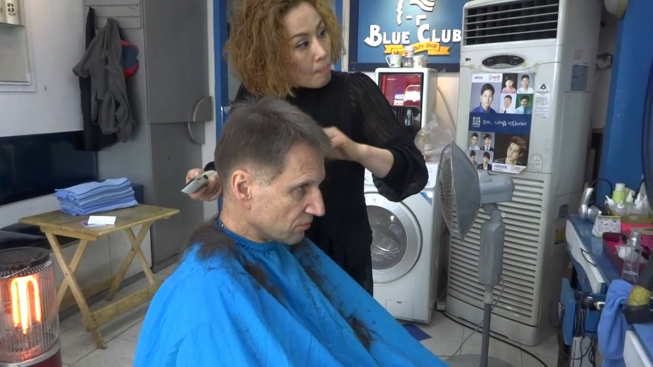 Getting a short clipper haircut in Korea.