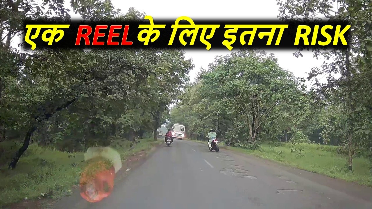 Biker almost crashes into a bus just for a Reel Wrong side riding in front of a bus coming at road