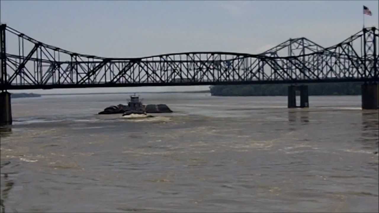 Mississippi River Flood 2011  Barges battling the current at Vicksburg