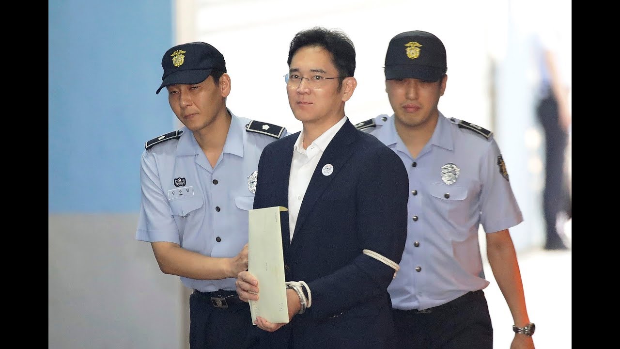 Billionaire Samsung chief found guilty of bribery and sentenced to 5 years in jail