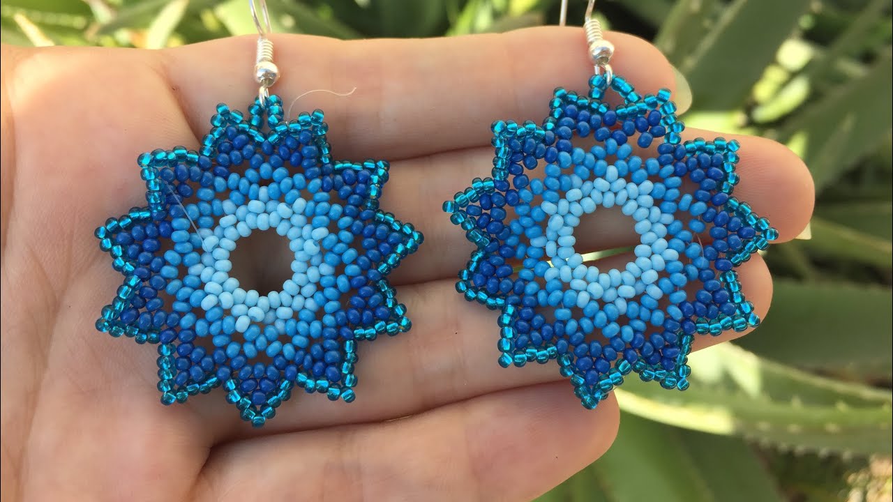 ARETES EN MOSTACILLA/ FLOR 11 PUNTAS