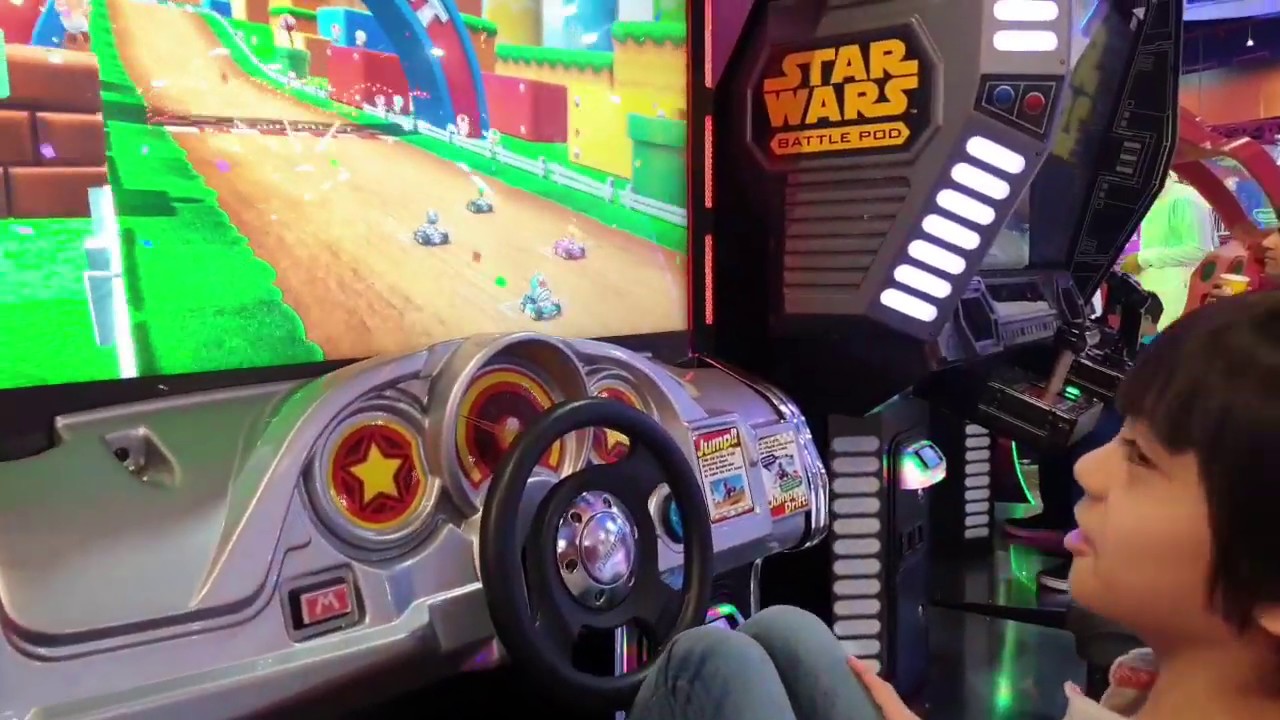 Playing in Arcade, nintendo super mario cart/ cruisin blast