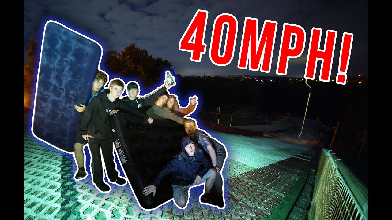 SLIDING DOWN SKI SLOPE WITH AIR BEDS