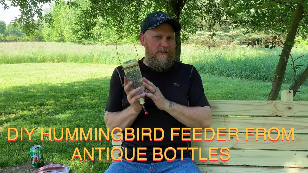 DIY Hummingbird Feeder made from antique bottles like Pepsi Coke Mountain Dew