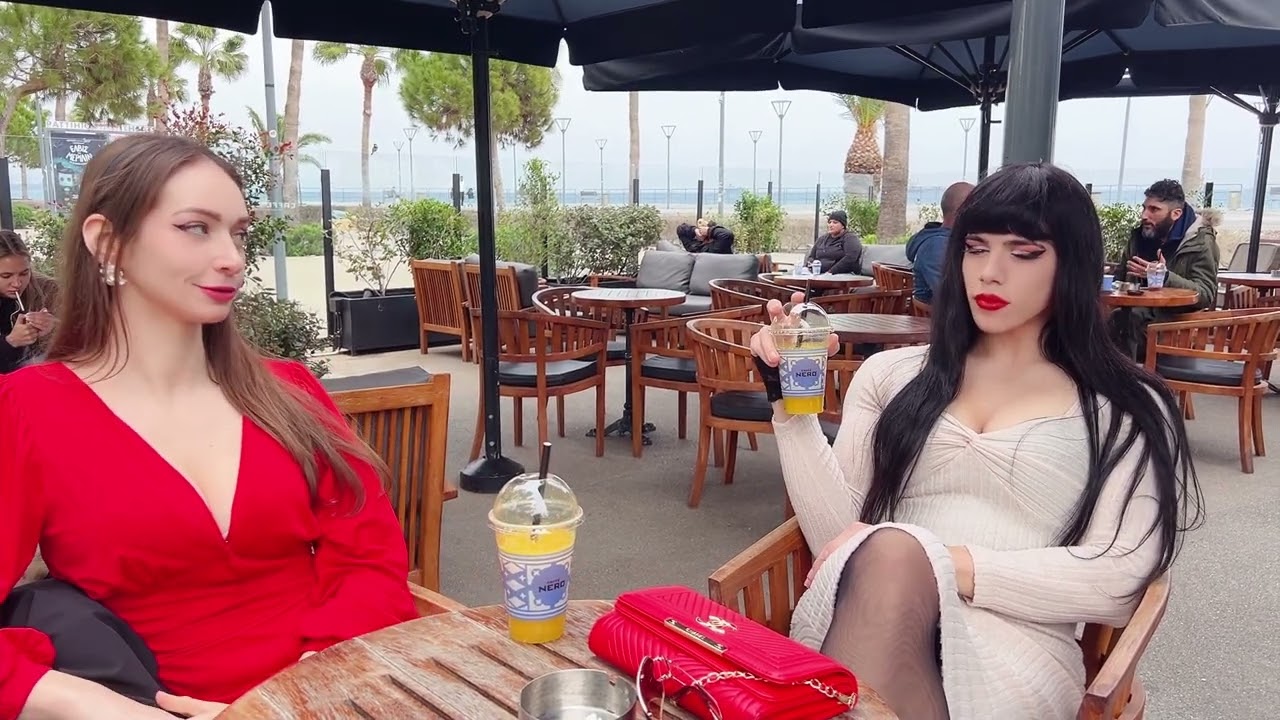 Crossdresser Sits at Cafeteria with Wife