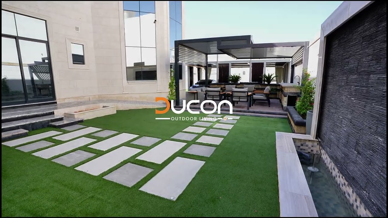 This Luxury Backyard Has EVERYTHING | Pavers/Slabs, Outdoor Kitchen, Water Features & Seating.