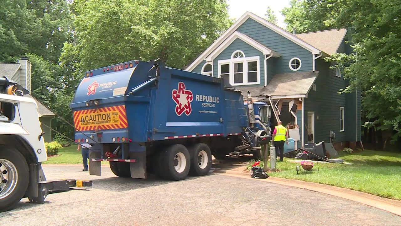 Garbage truck hits NC house, destroys 1968 Mustang in garage