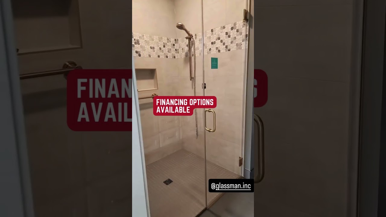 Frameless Glass Shower Doors with Satin Brass Hardware | Custom Installation by GlassMan Inc.