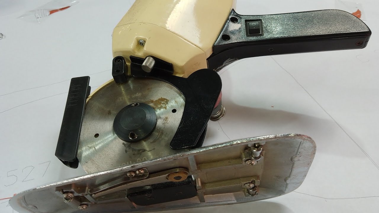 Como trocar o disco da máquina de cortar tecido #confecções #costura #tecidos