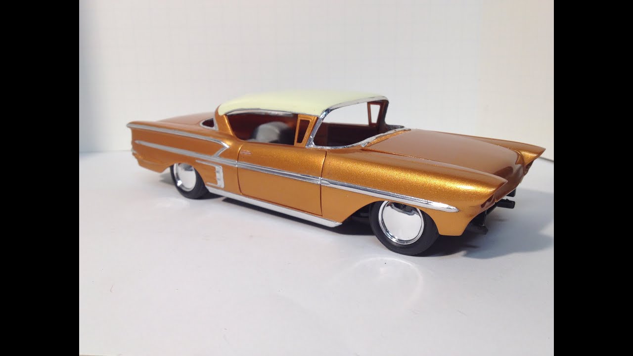 Spraying acrylic craft paint on model car body