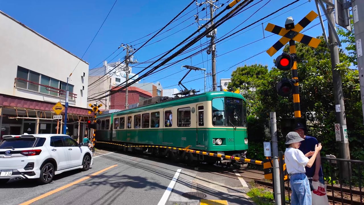 Trains run on the road! A walk in Kamakura, a seaside suburban village. Japan travel walking tour.