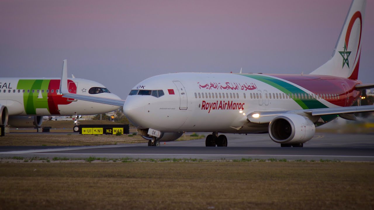Royal Air Maroc Boeing 737-800 taking off at sunset from Lisbon Airport LPPT