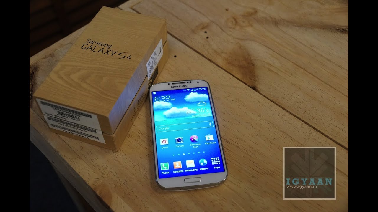 Samsung Galaxy S4 i9500 Unboxing, Setup and Hands on Review - Feat HTC ONE - iGyaan