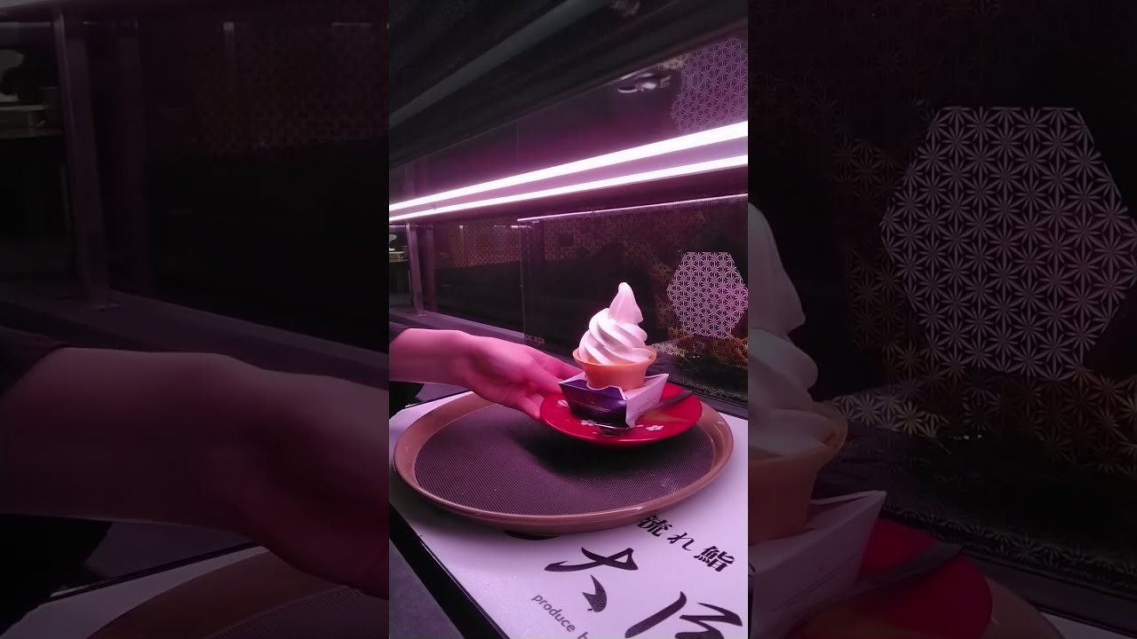 Automatic tray system in Japan delivering ice creams to restaurant table
