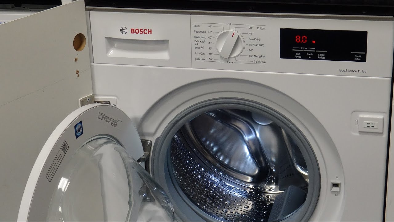 Полностью встраиваемая стиральная машина Bosch WIW28302GB со скоростью вращения 1400 оборотов в м...