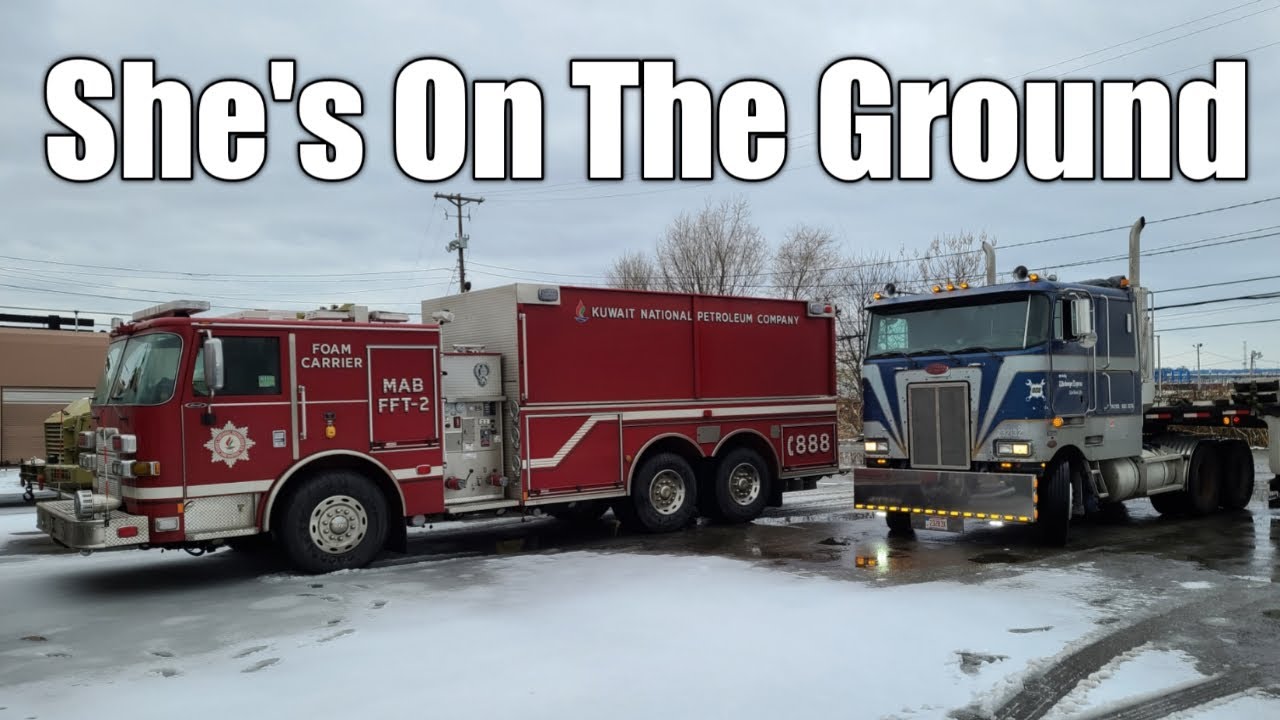 Peterbilt Cabover Unloads Kuwait Fire Truck