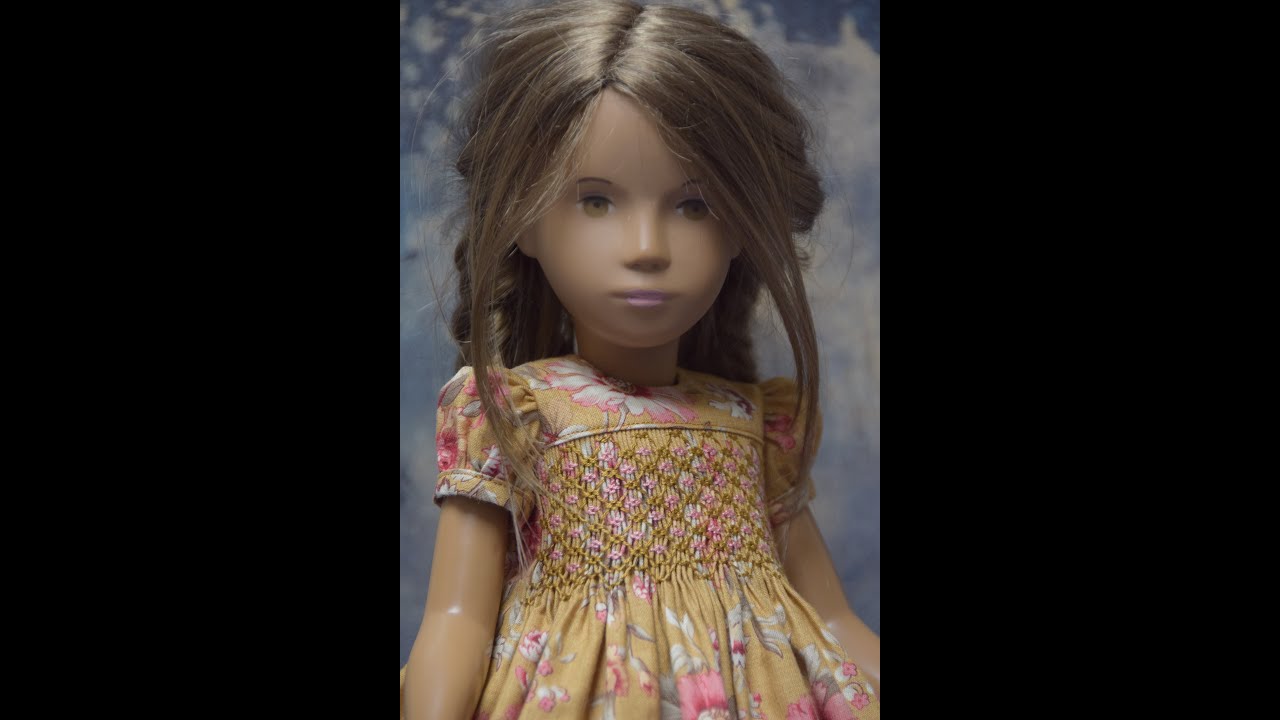 From pleating to a finished hand-smocked and embroidered doll dress