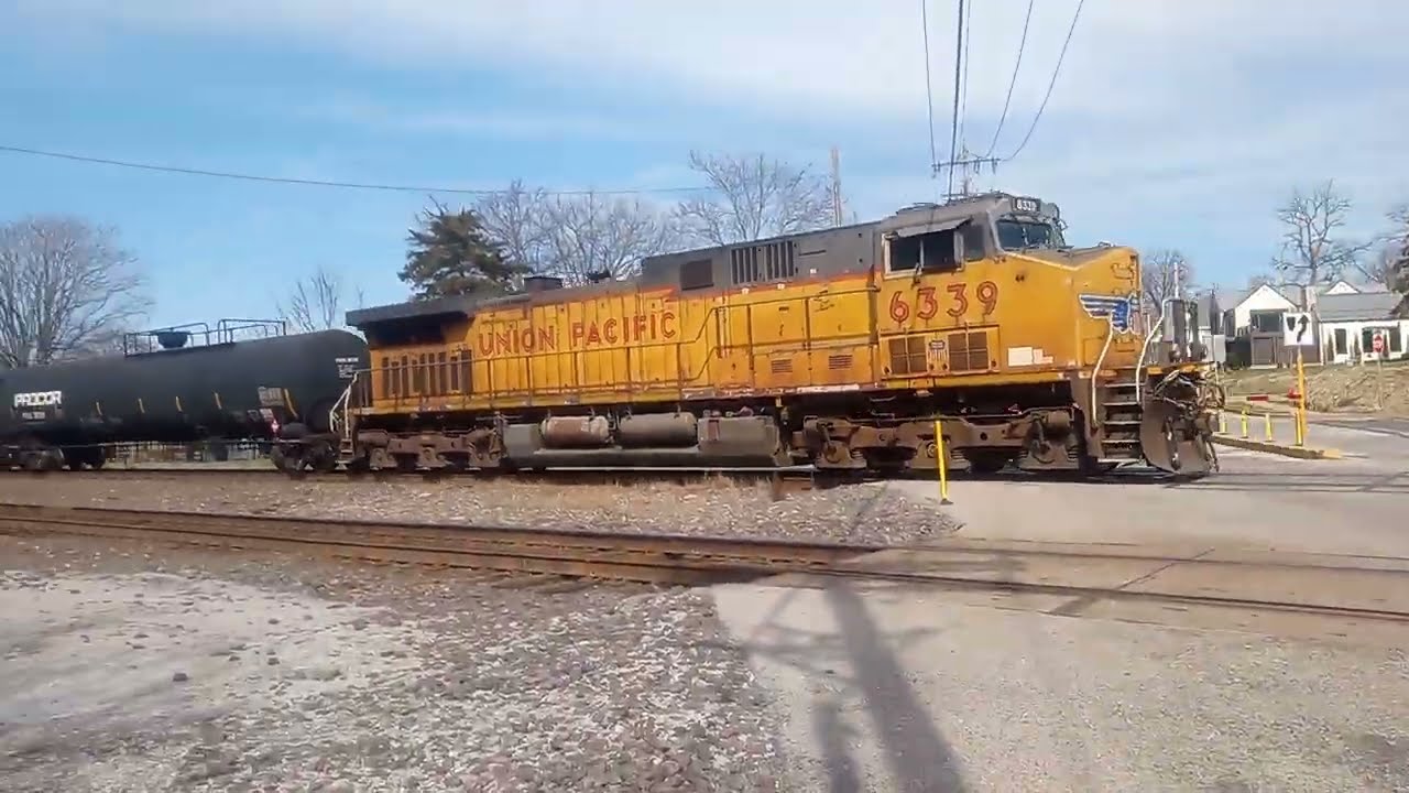 UP 8748 leads MASNP westbound in Kirkwood MO 