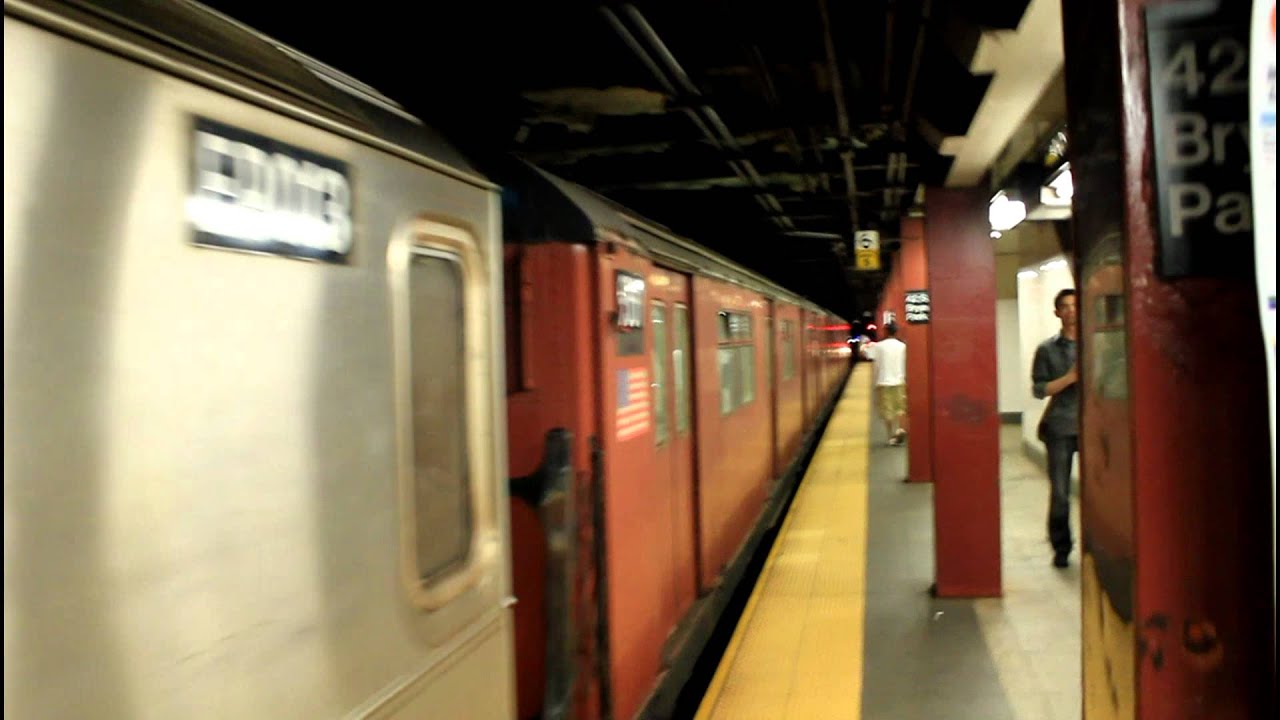 NYCTA: R33WF Redbird cars (with SMS R62As) at 42nd Street / 6th Ave