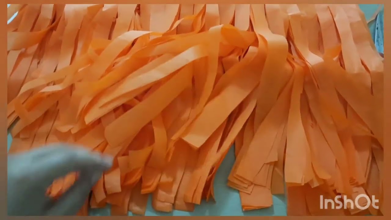 ¡Cómo hacer pompones con papel de china!