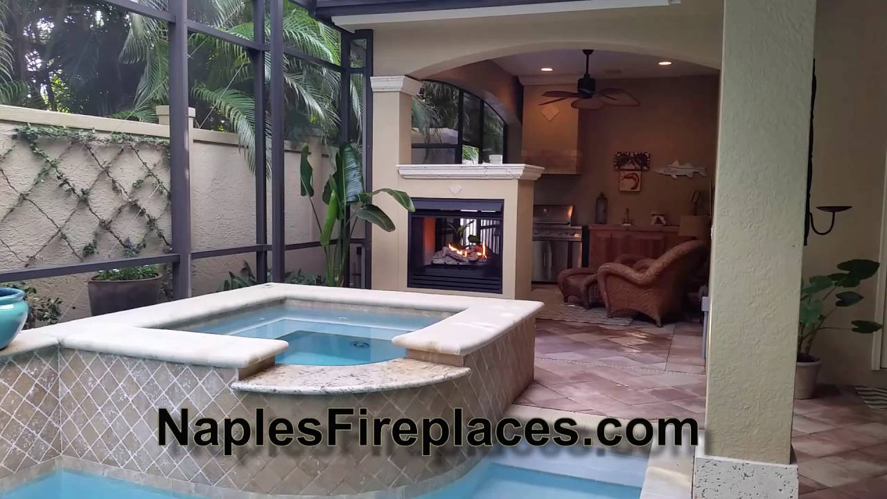 Vue thru two sided outdoor fireplace.