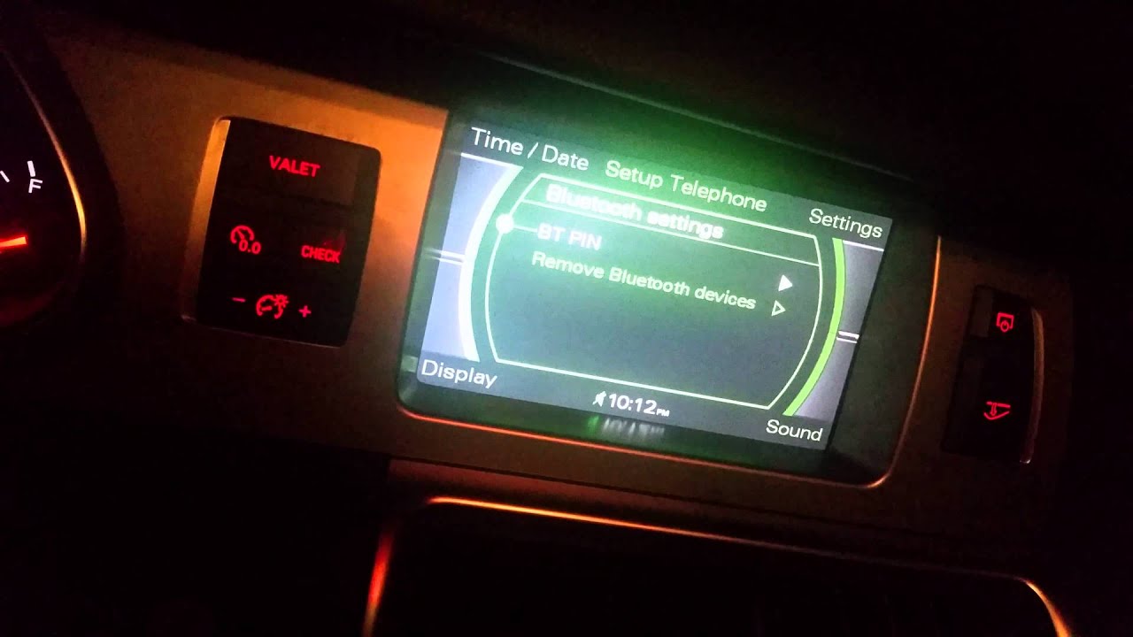 Audi Q7 2007 года выпуска. Как подключить Bluetooth к телефону для совершения звонков?