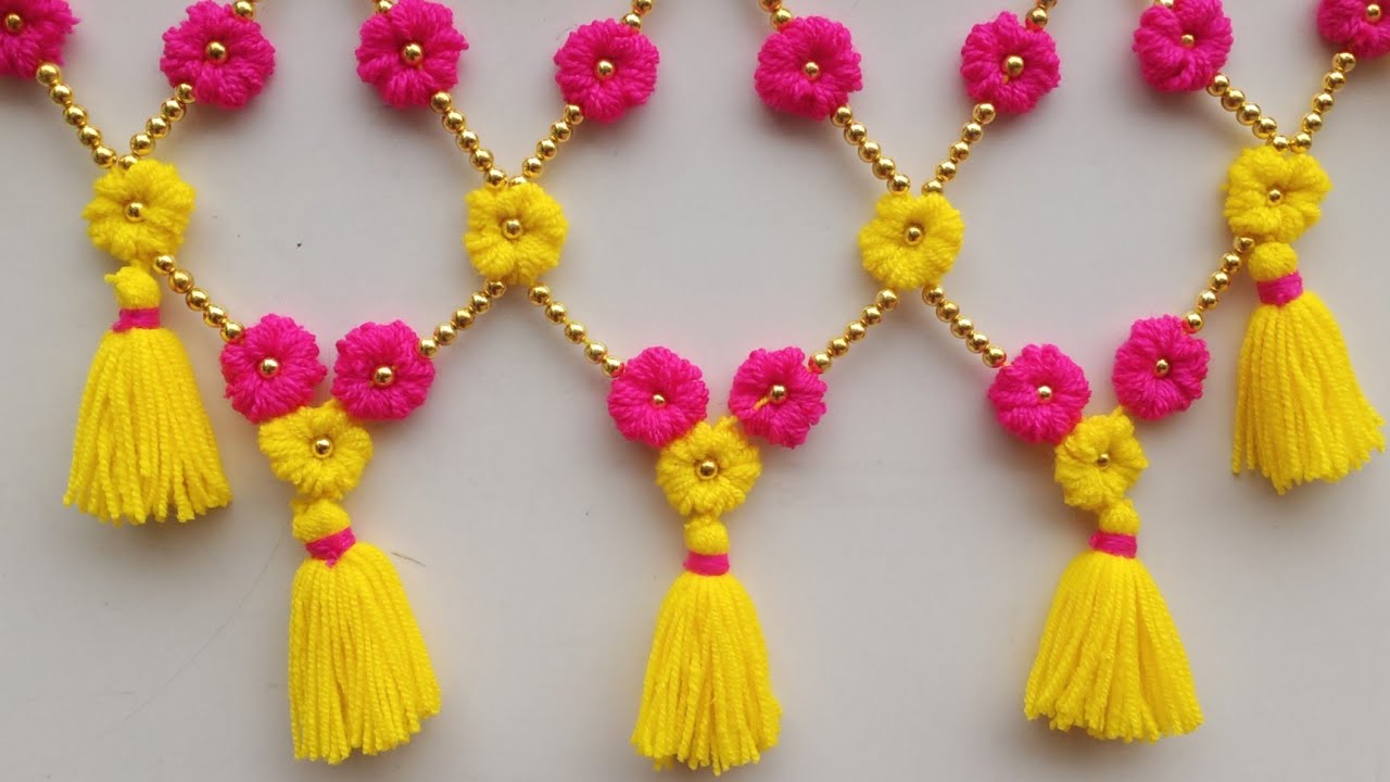बिना क्रोशिया के बनाए दरवाजे की झालर/Woolen flower toran/New design jhalar/ Woolen craft ideas Easy