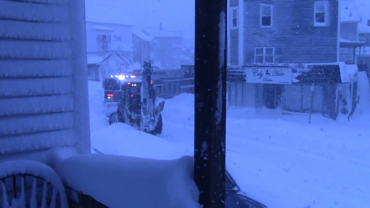 Dump Truck towing  a Fire Truck because of the 2026 Blizzard in MA