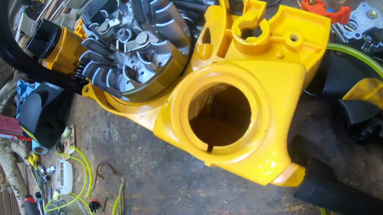 Putting new gas lines and carburetor on Poulan Pro chainsaw .