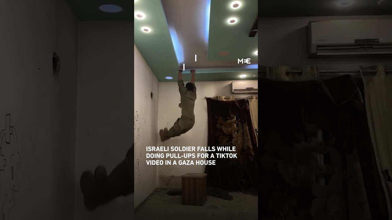 Israeli soldier falls while doing pull-ups for a Tiktok video in a Gaza house