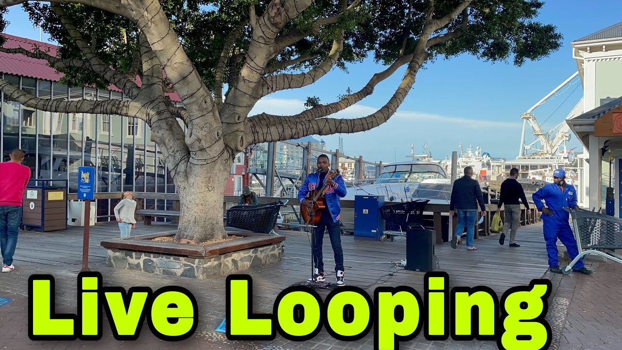 Local South African Street Musician Playing At The V&A Waterfront In Cape Town.Amazing Street Music