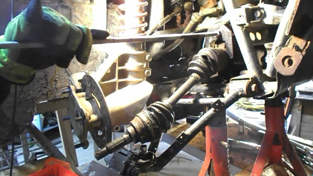 how to remove a cv axle off a 2001 kawasaki priaire  400 4x4 when   you have no money