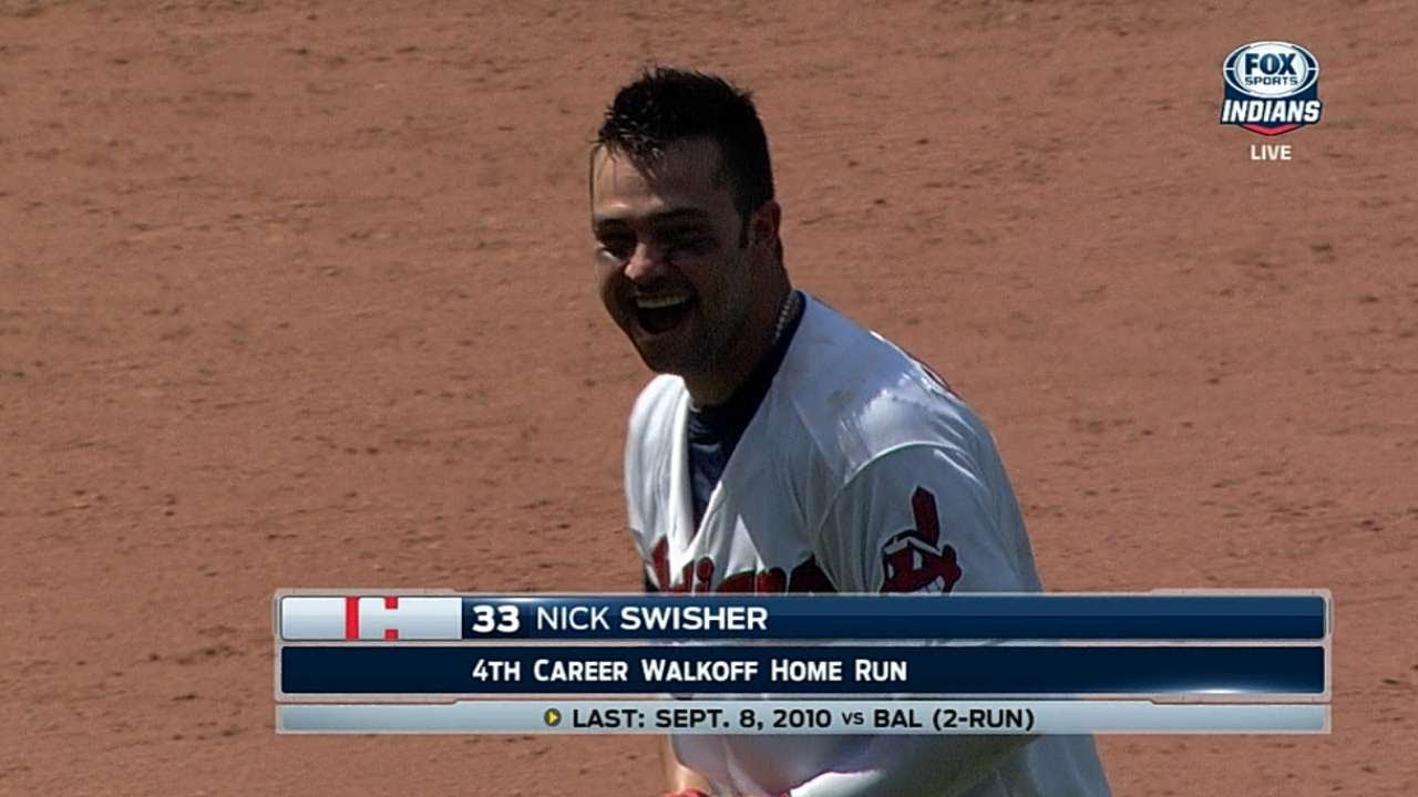 Swisher launches walk-off slam in extras