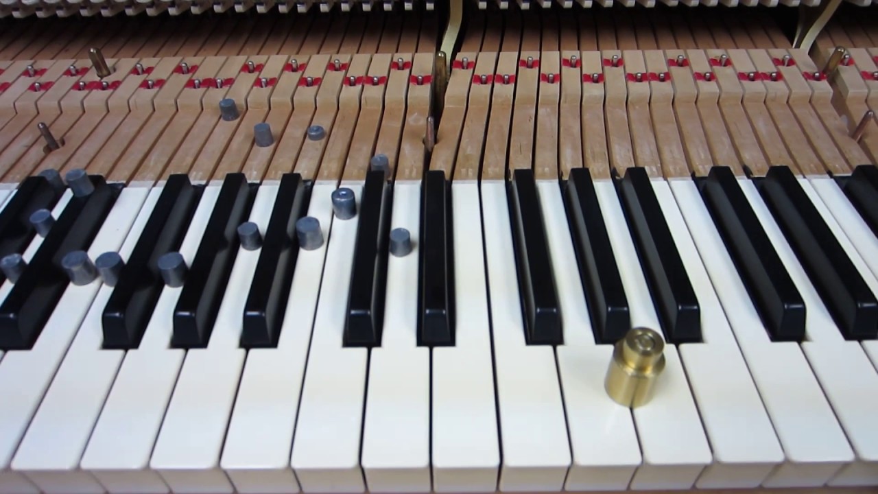 Weighing off a piano keyboard action