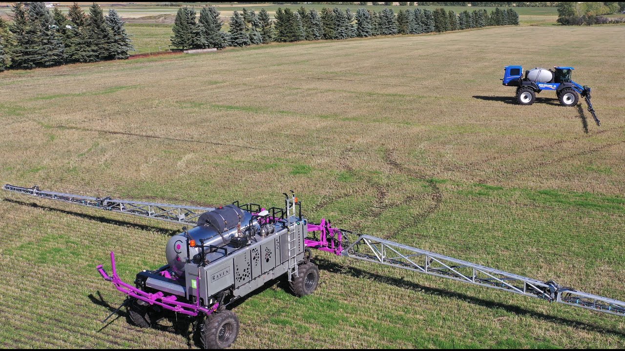 JOB SYNC. NEW HOLLAND SP.370F AND OMNi POWER SPRAYERS. Alberta, Canada.