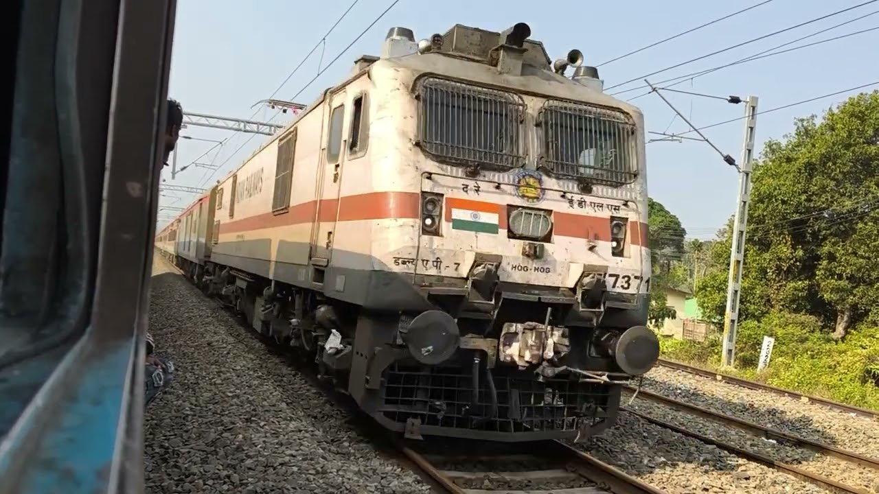 15910 Avadh Assam Exp overtaking 75601Lmg - Tsk Demu at Rangapahar Railway Station.
