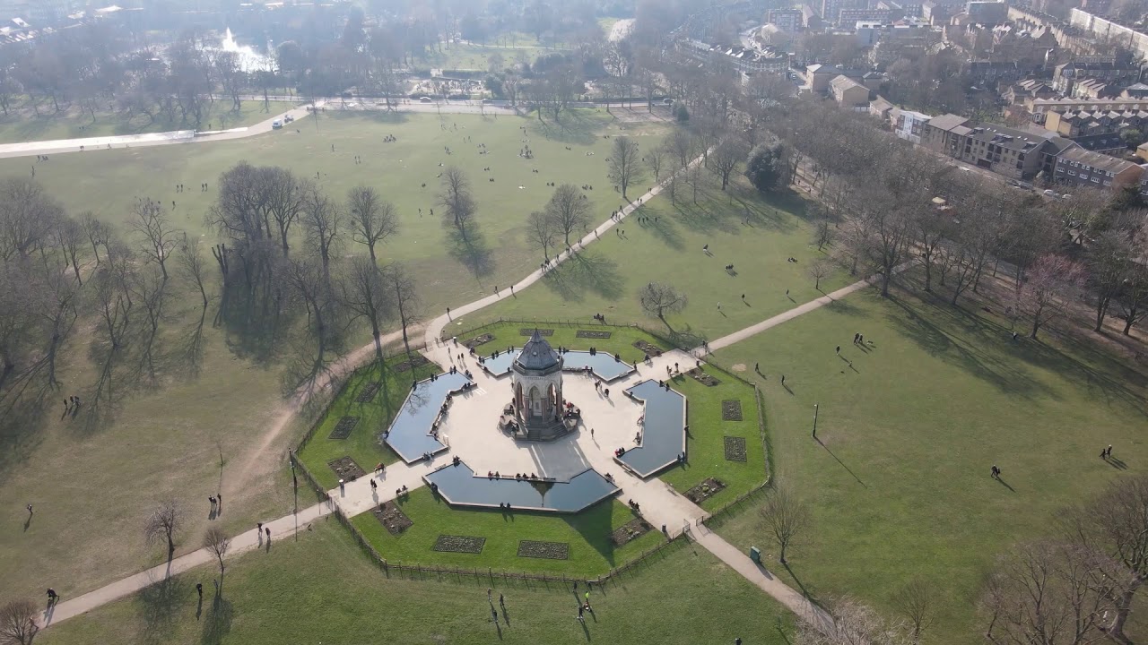 Aerial drone View of Victoria Park, in East London and beyond on nice day - Hackney, Tower hamlets