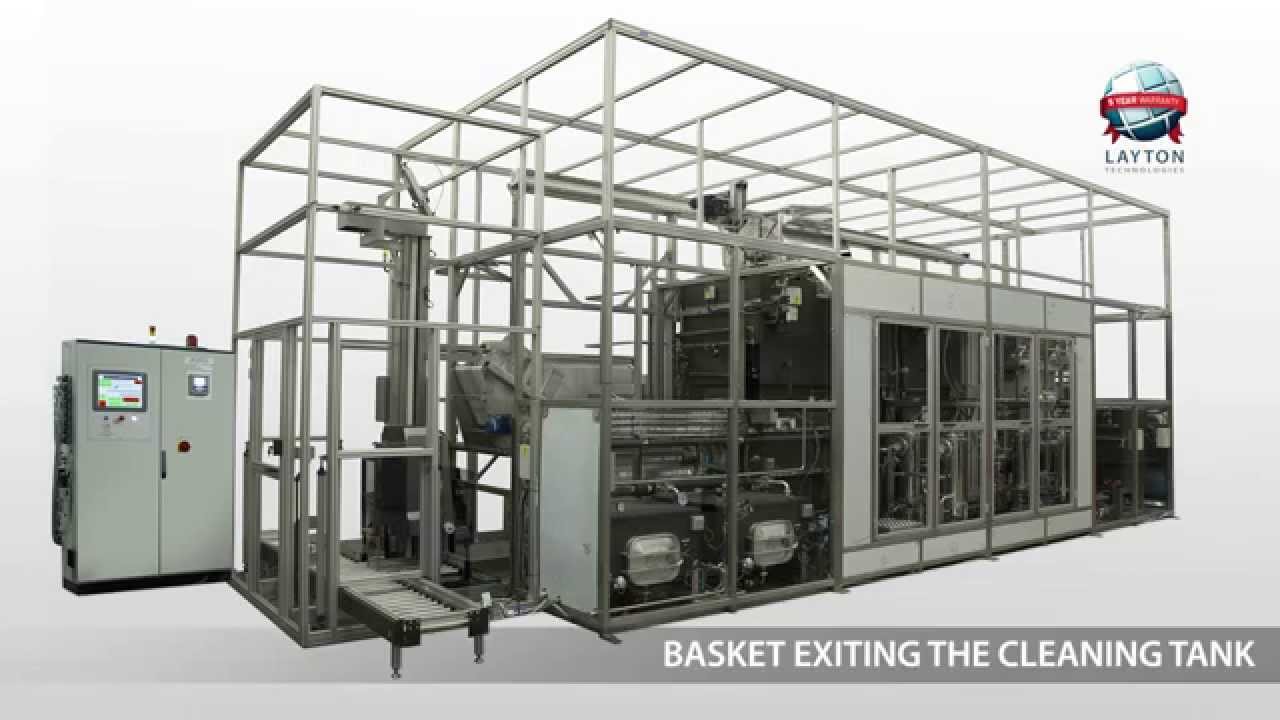 Large low emission HFE solvent ultrasonic cleaning and drying machine.