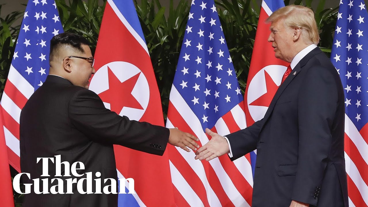 Moment Kim Jong-un and Donald Trump share historic handshake