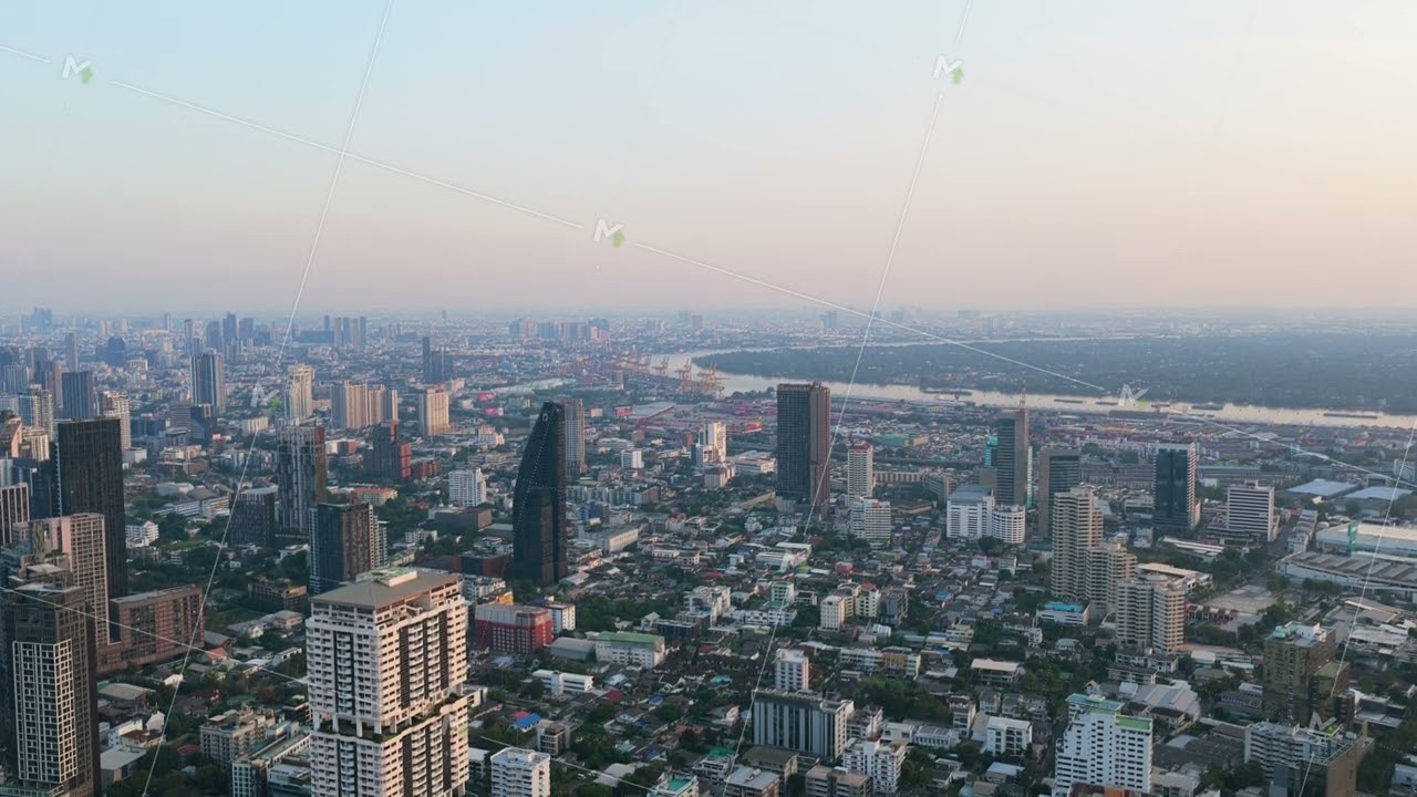 Aerial panorama from a unique perspective of Bangkok's sprawling urban landscape, featuring modern