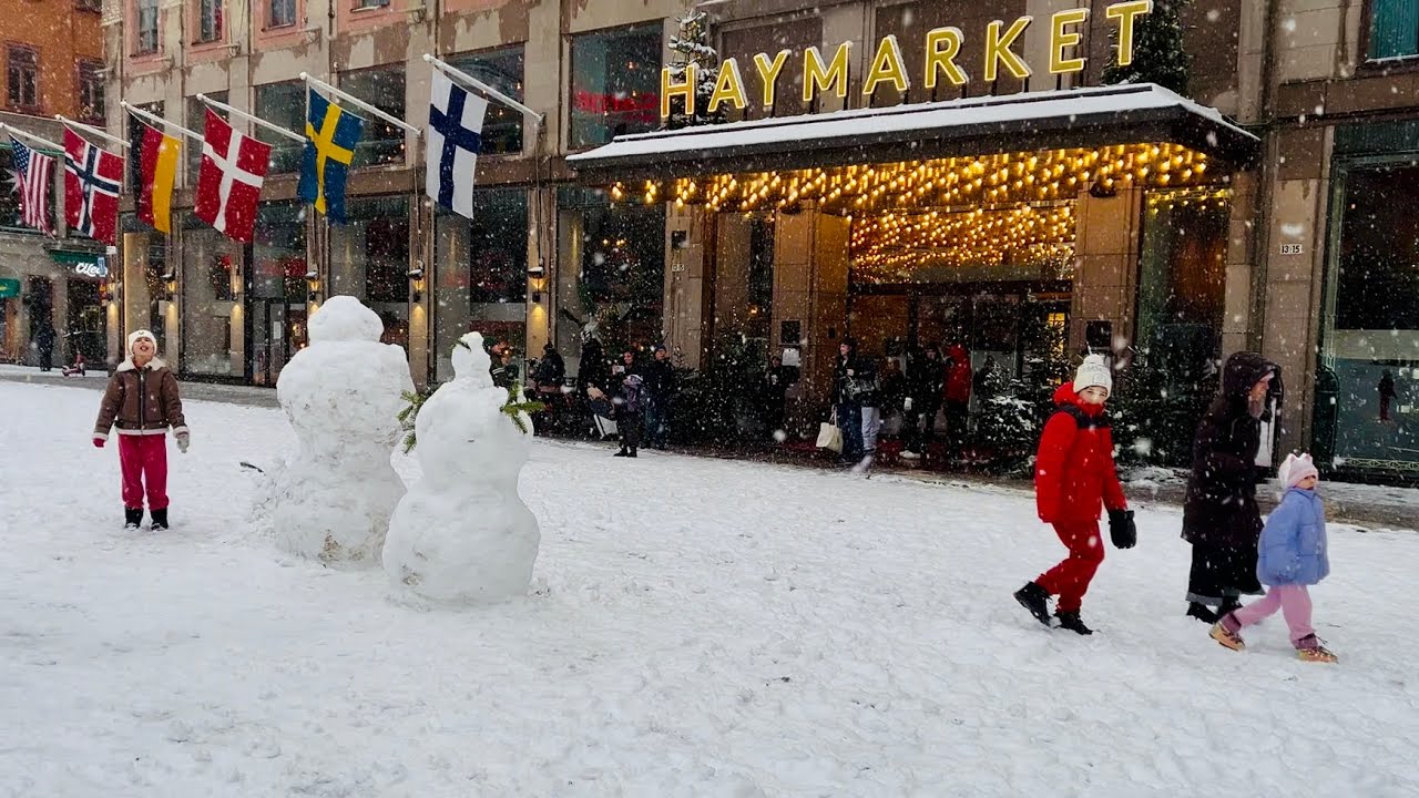 Snowy Stockholm Walk: city center snowmen, snowfall and quiet streets. 