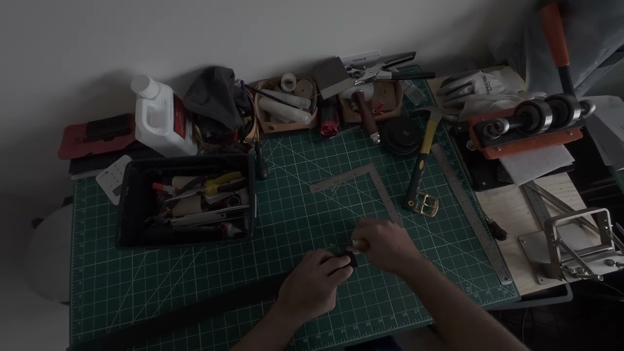 Attaching a belt’s buckle. 