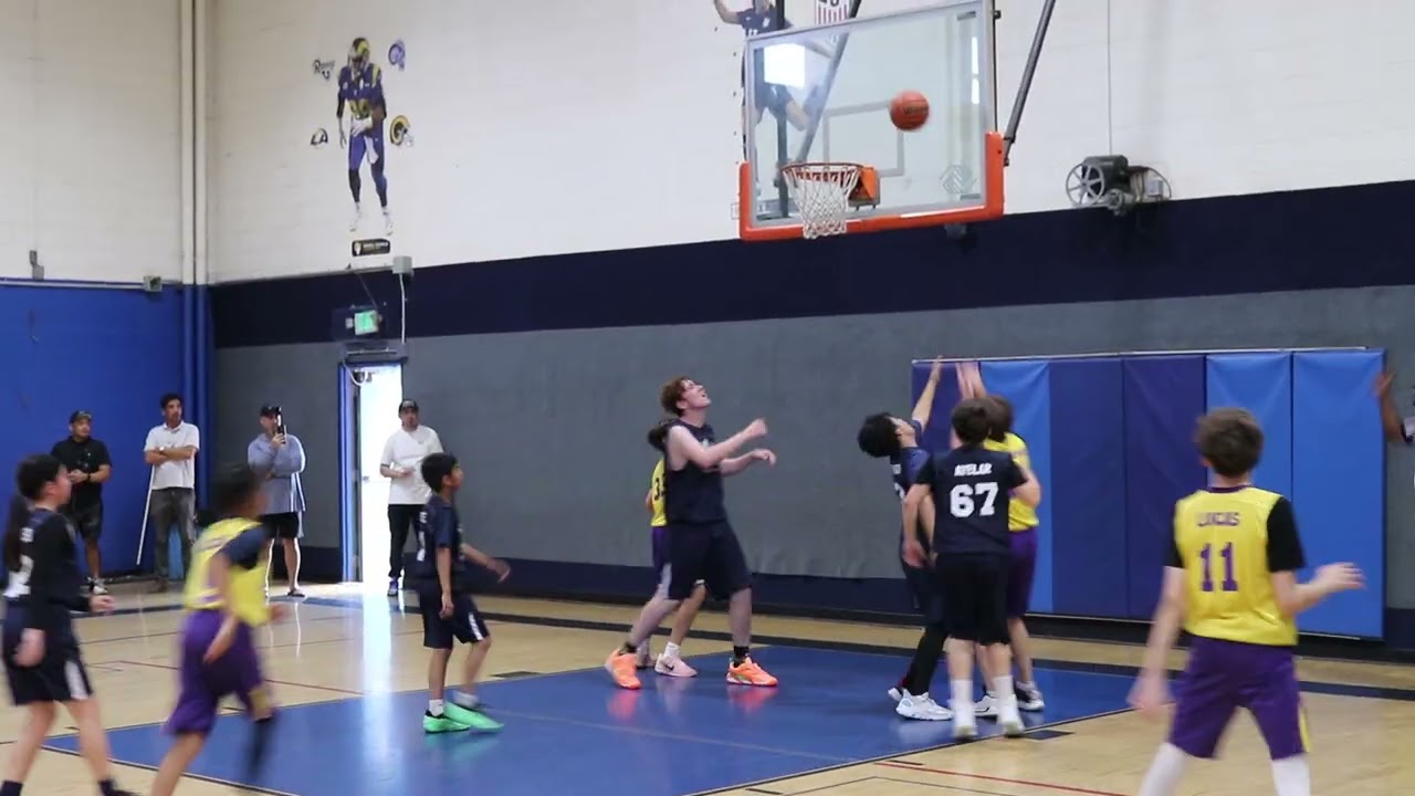HUNTER WON'T BE DENIED AS HE GETS THE HOOP AND THE HARM FOR THE 10-12 LAKERS.