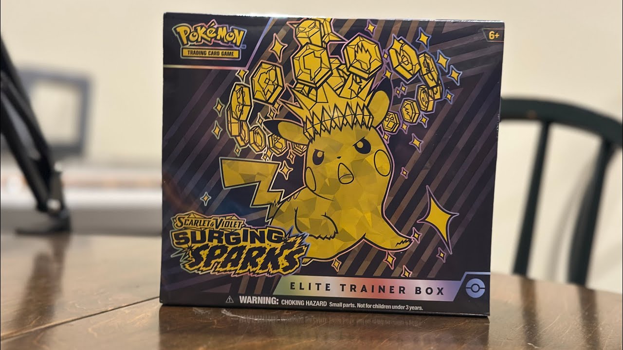 Opening a *NEW* Surging Sparks Elite Trainer Box with a special guest!