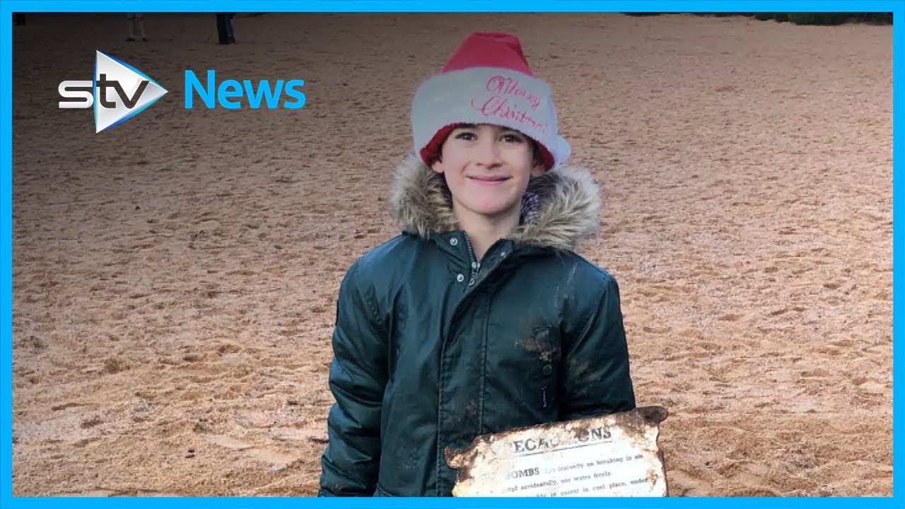 Boy’s metal detector uncovers bombs on beach